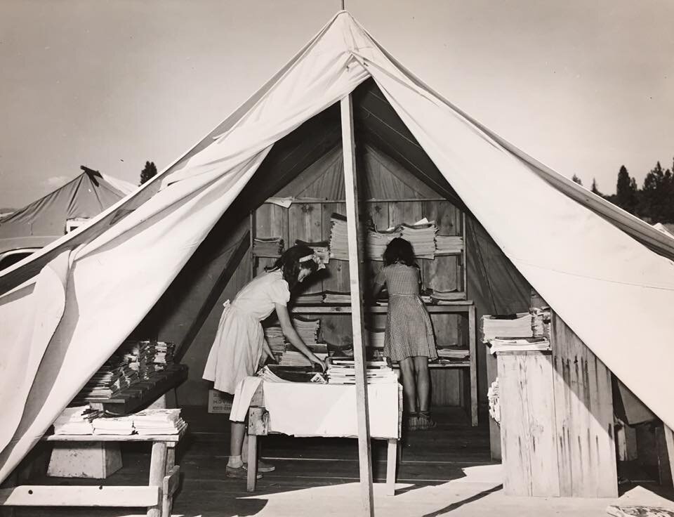 1941 Odell, Oregon. The library tent at a Farm Security Administration's mobile camp for migratory farm workers.jpg