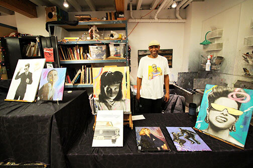 Community Artist sells art at the CAP Art Market.JPG