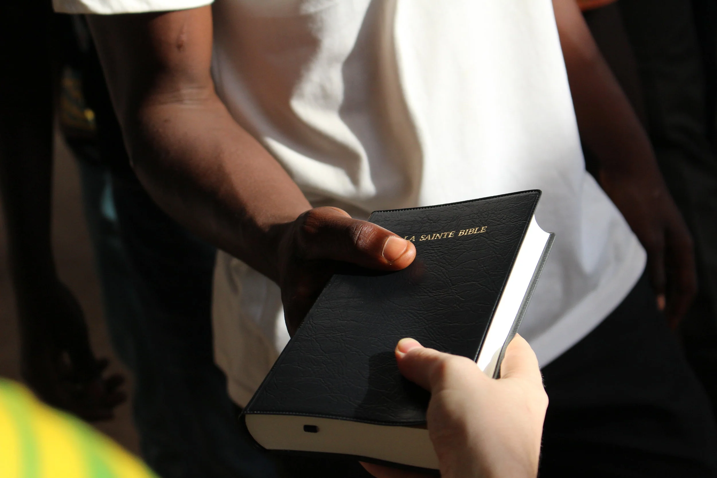 Hands with Bible.jpeg