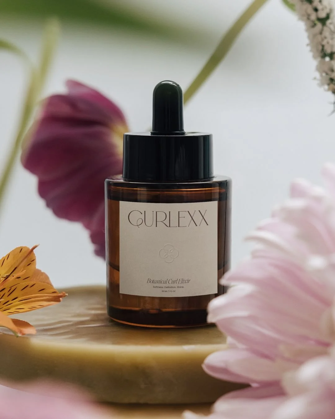 Brand Identity for CURLEXX. 🌸

A luxury curl care brand empowering women to embrace their natural texture with confidence and ease.

Drawing inspiration from floral details and a soft, refined colour palette, we developed a sophisticated identity th