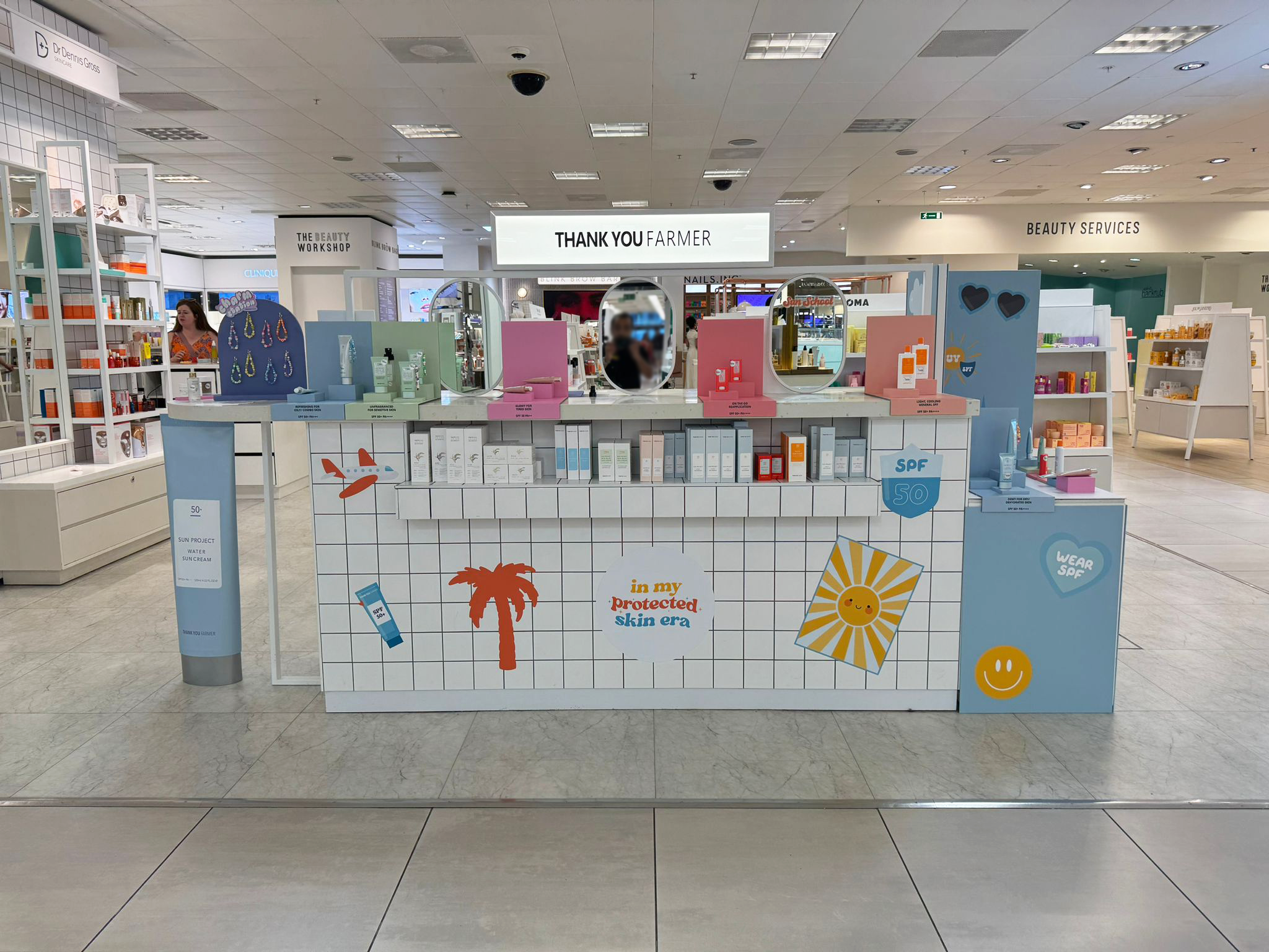 Thank You Farmer branded pop-up stand at Selfridges London featuring custom illustrations and sticker designs by Lorna Ami Studio