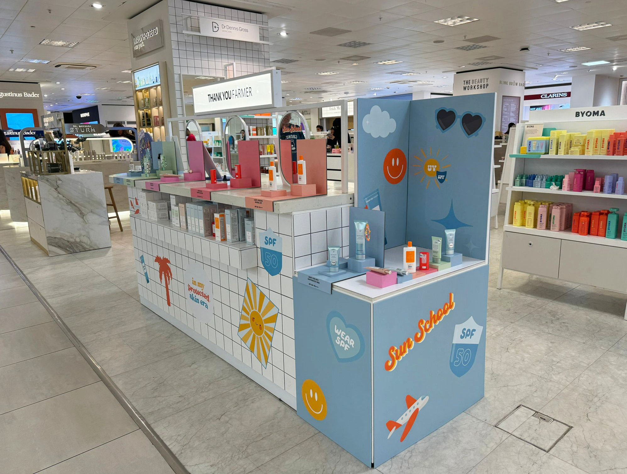 Thank You Farmer branded pop-up stand at Selfridges London featuring custom illustrations and sticker designs by Lorna Ami Studio