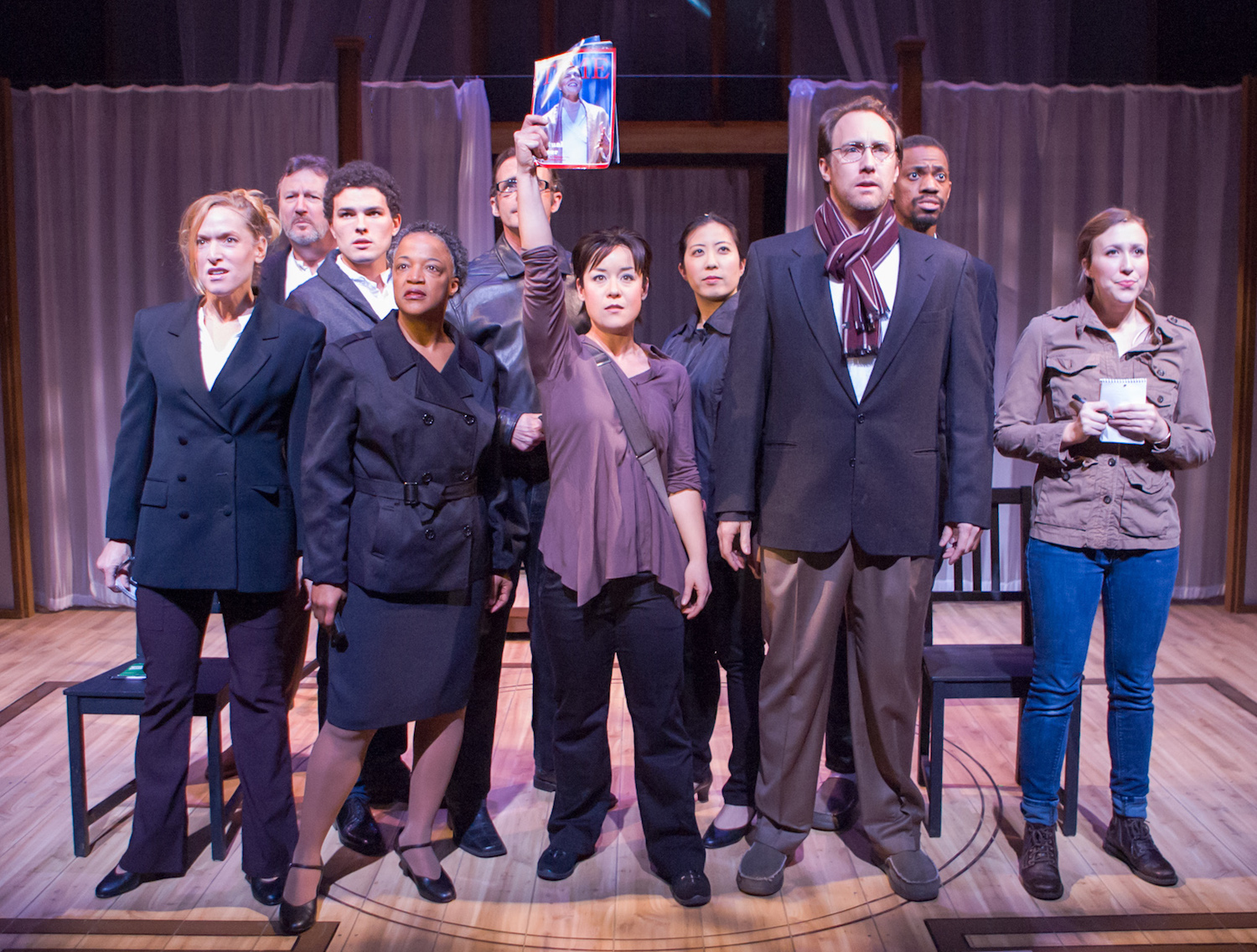 L to R: Bekka Fink, Dave Garrett, Barnaby James, Cathleen Riddley, Jackson Davis, Anna Ishida (with magazine), Alexis Wong, Will Springhorn Jr., Reggie D. White, Simone Kertesz. Ashby Stage. Photo: Mike Padua.