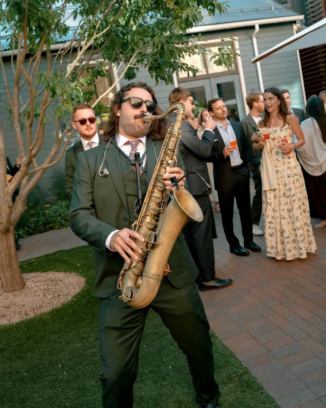 An open-air celebration. Music moving through the crowd. Dancers, live musicians, sparks in the night &mdash; and a dance floor that never loses momentum.

This is how we approach entertainment. Not as a playlist, but as an experience designed from t