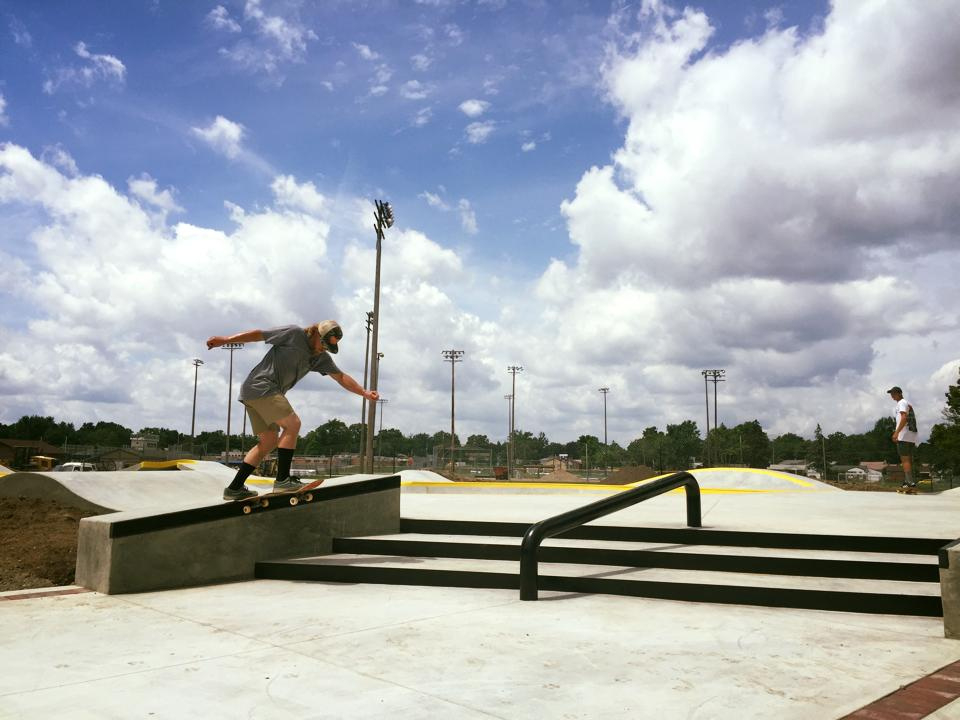 Crew member Jesse Clayton with a backtail on the skate path