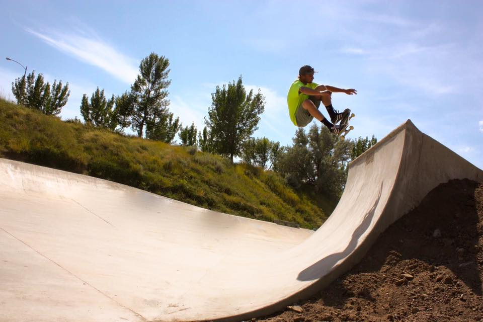 Crew member Richie Conklin gets some air on the Montana Pool Service Wall