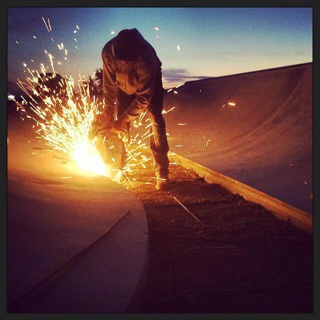 Richie Conklin cuts concrete at sunrise
