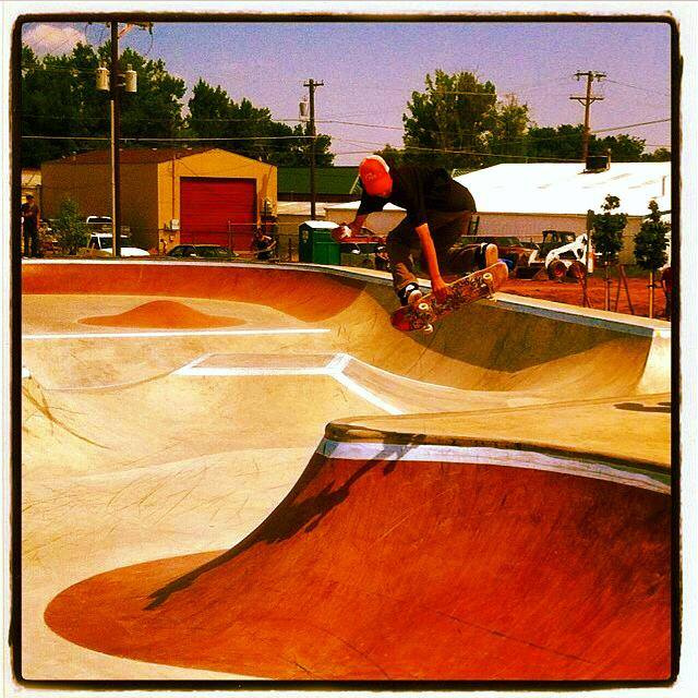 Jaeson airs over the hip at the Milliken, Colorado Skatepark