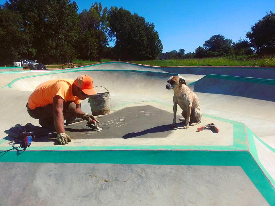 Tavita & Heyla the dog put the finishing touches on the Hernando, Mississippi Skatepark