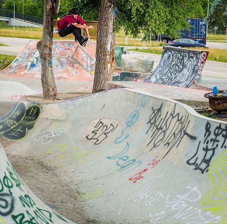 Kyle Walker threads the needle at Ride It Sculpture Park in Detroit. Photo by Joe Brook.