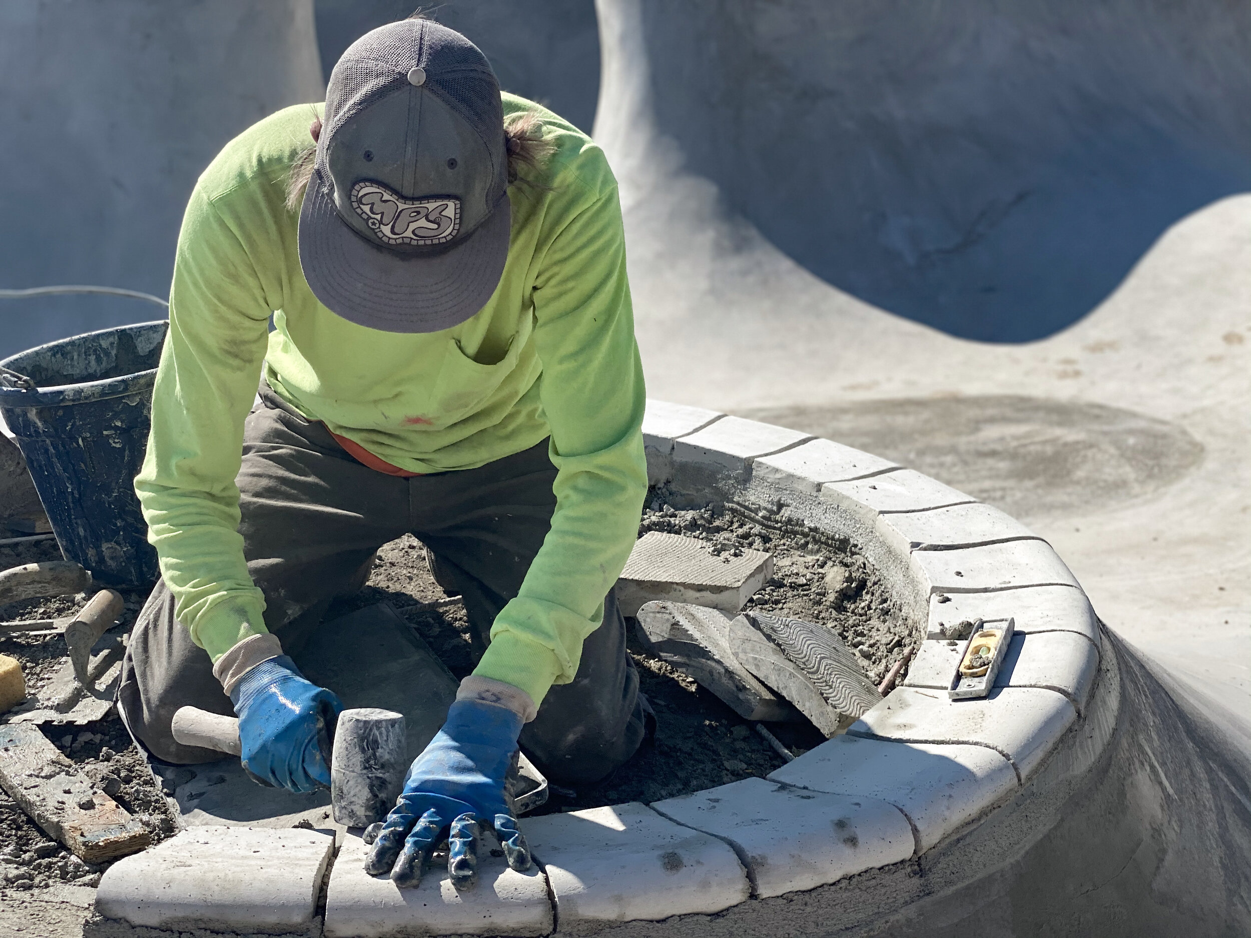 Volcanic 🌋 edging pool coping installation by Lance Spiker in Red Lodge, Montana