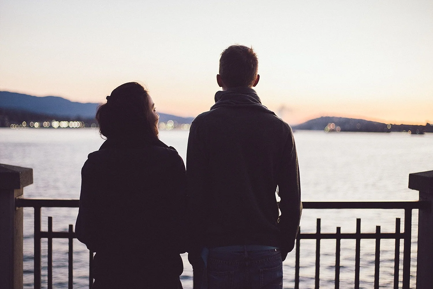 Couple looking out over the city of Vancouver