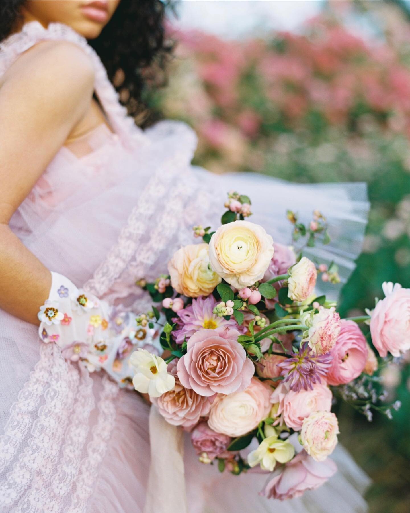 When one shot has it all... garden roses, ranunculus, a lilac tulle gown, colorful floral appliqu&eacute; gloves, hand died silk ribbon and perfect light. This shot from last year has to be one of my all time favs with an incredible team to make it h