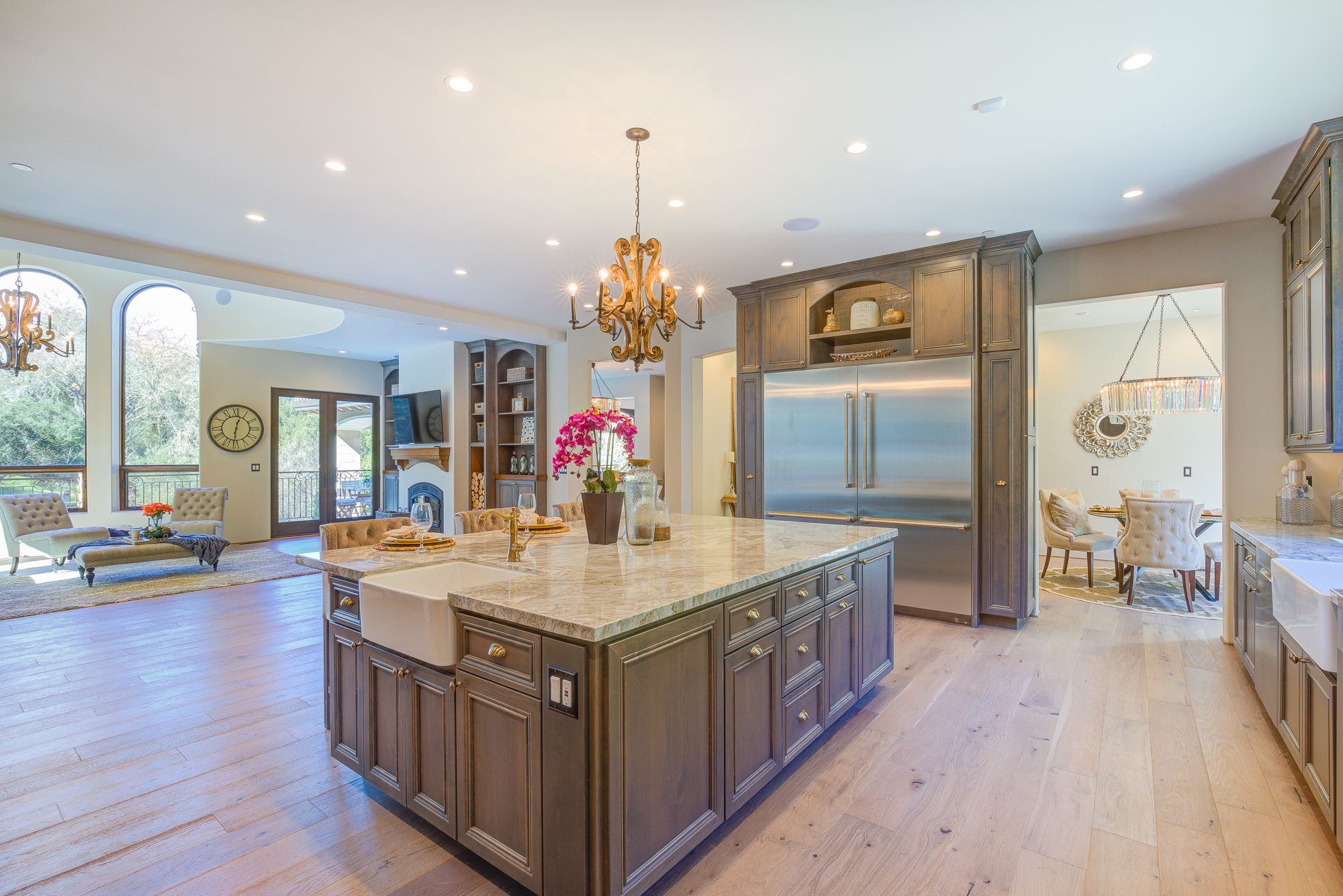 The full height kitchen cabinetry is custom made of all American hardwoods and plywood’s hand-stained to perfection and protected with a conversion varnish top coat. 