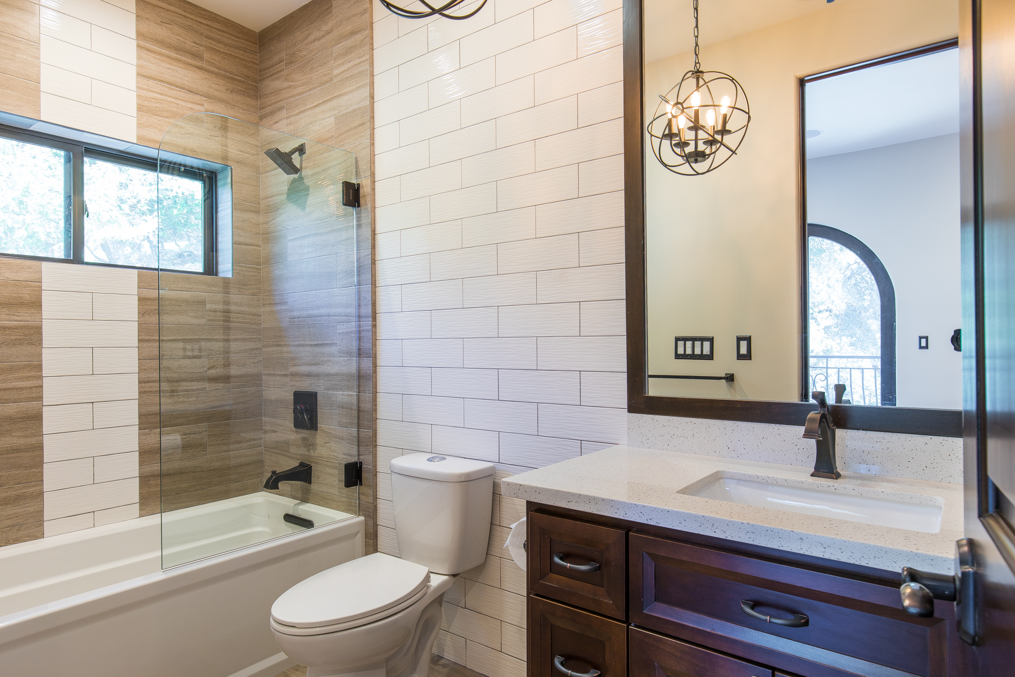  Three of the bathrooms feature seamless glass enclosures and two bathrooms feature bathtub combinations 
