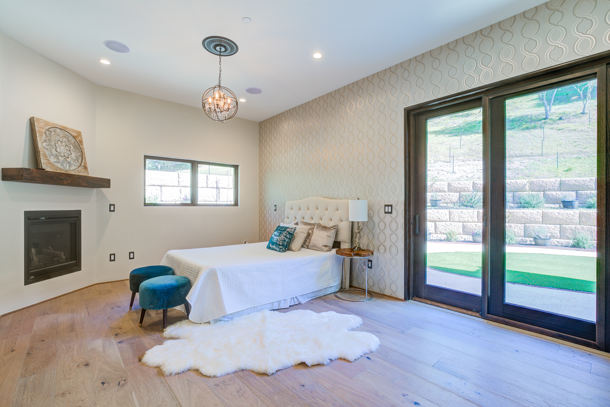  Each of the sun filled rooms is large, open and full of light and features custom designer interior paint, European white oak hardwood flooring, recessed lighting and metal orb crystal chandeliers 