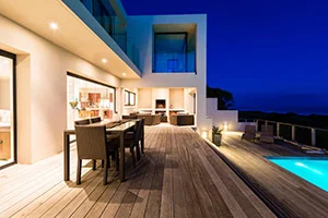 An extravagant pool deck of a luxury house