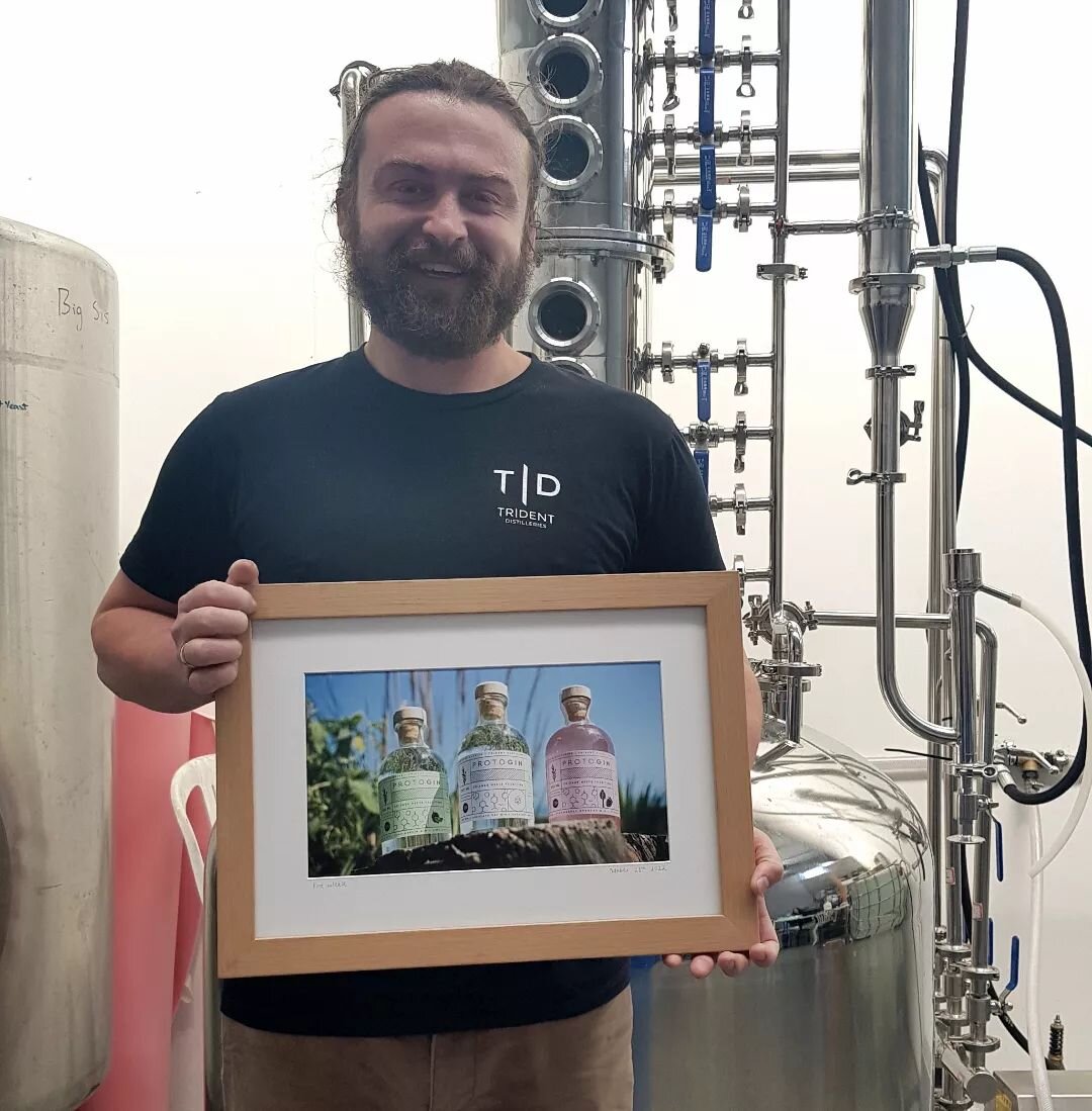 We love seeing the smiling faces of all the happy clients who get prints or frames from us!
Here's the boys at Trident Distilleries enjoying their first official release of craft gin and a framed print to commemorate the day.
Printed on Ilford Smooth