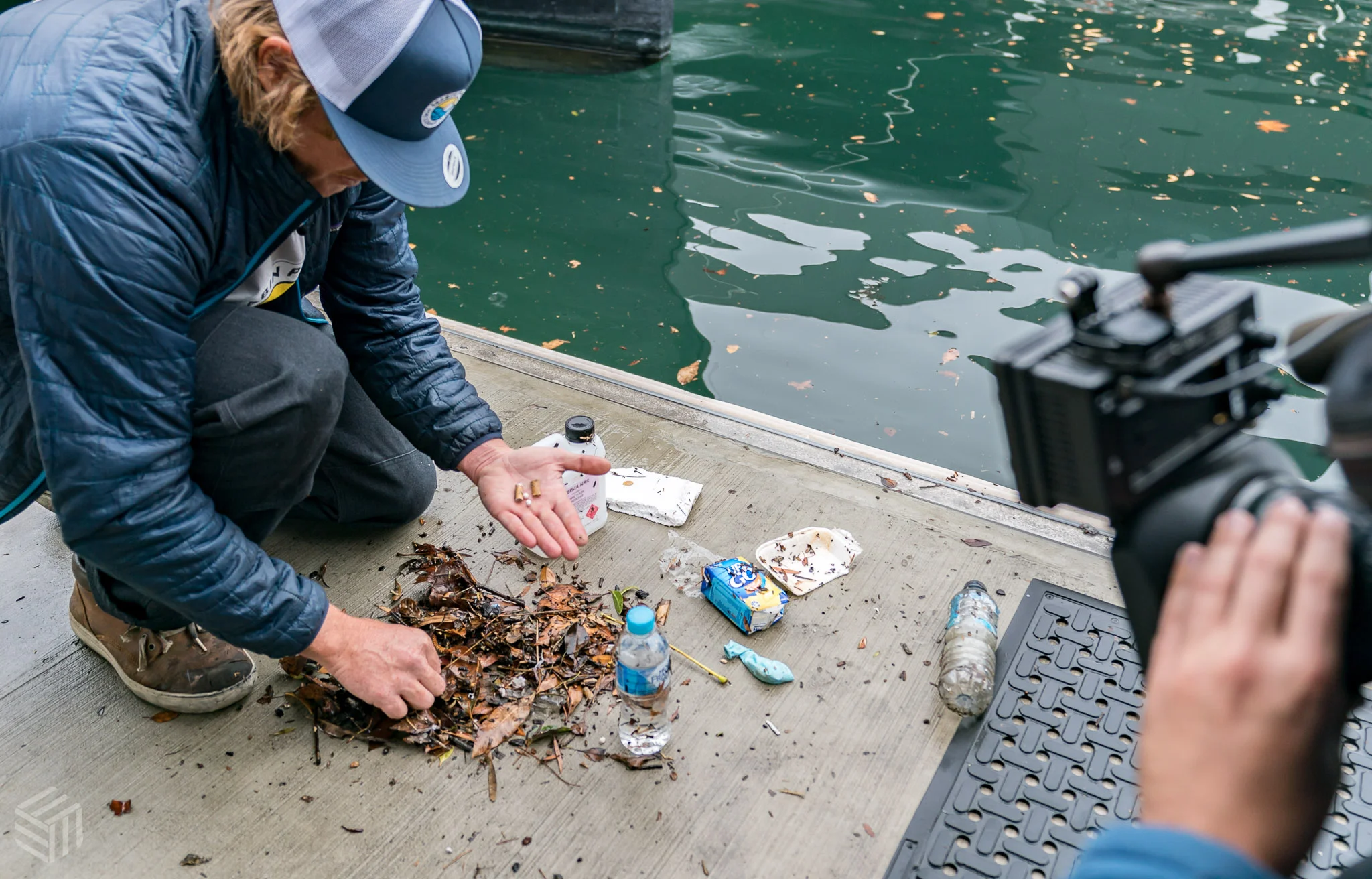 Micro plastics are hard to see until a closer inspection of the debris revealed large amounts of micro plastic mixed in with the organic matter. Photo by Elliot Kirkwood Photography