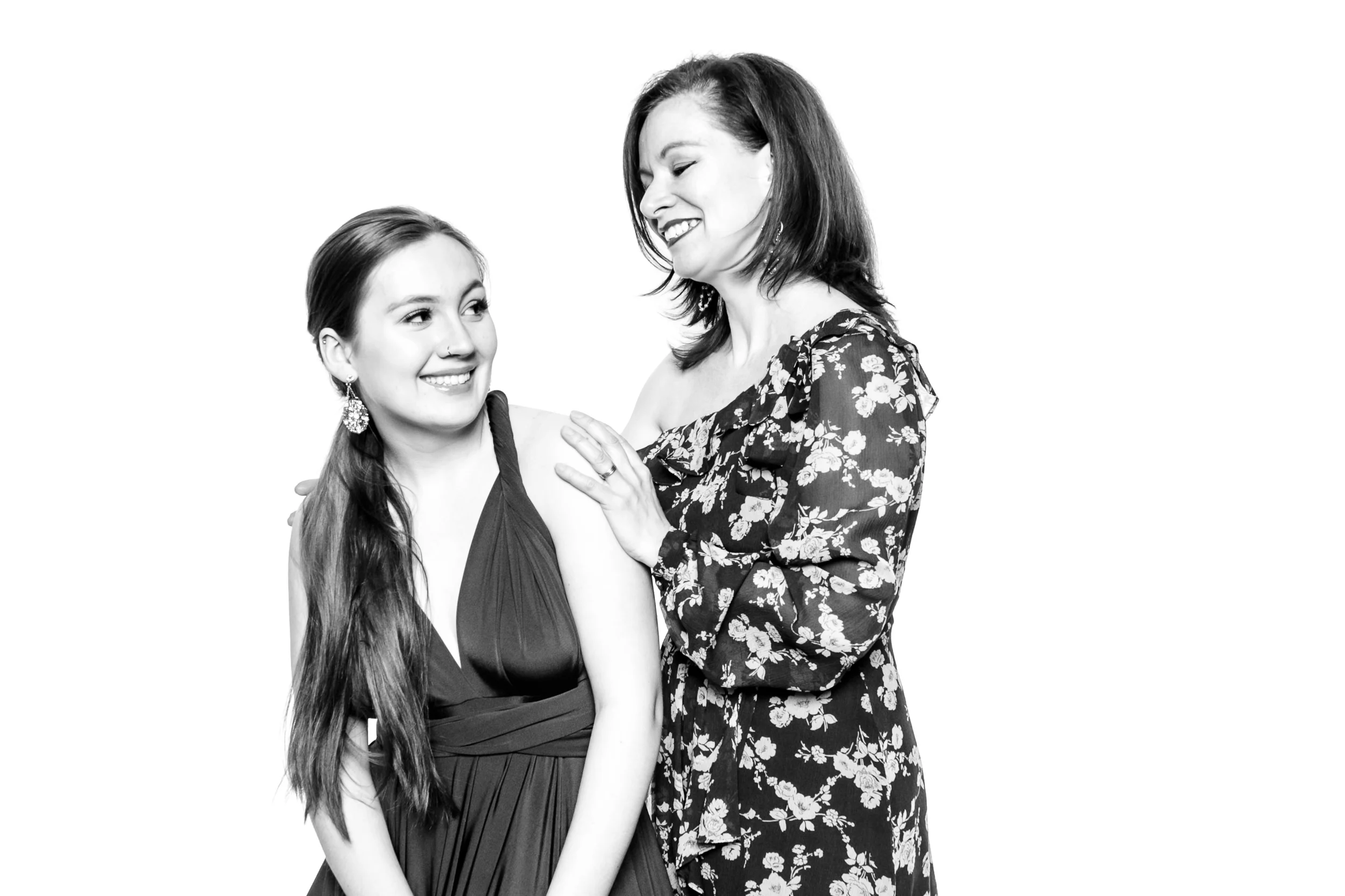 Joanna and her daughter hop in the booth showing off bling from Joanna Bisley Designs.