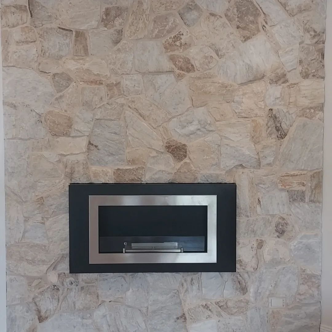 Inside feature wall with fire inset.
Product, Mykonos. 
Supplier, @stone_style__
