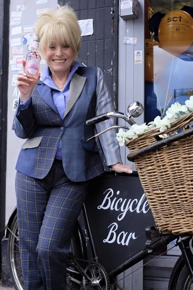 Barbara Windsor serves up a treat at east London Charity Event