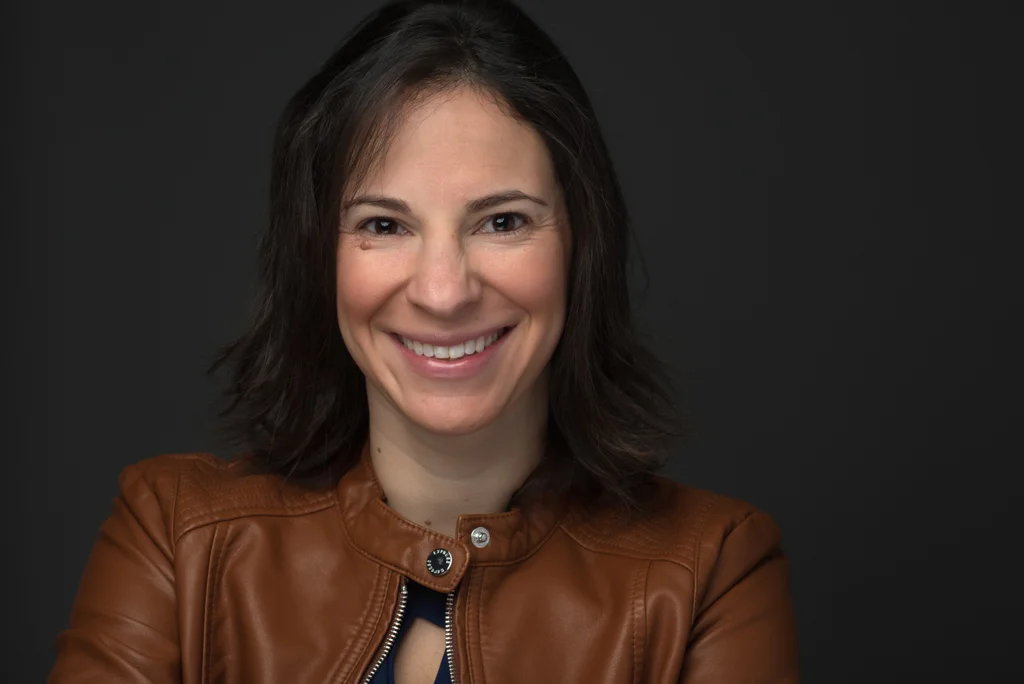 Woman headshot, gray backdrop