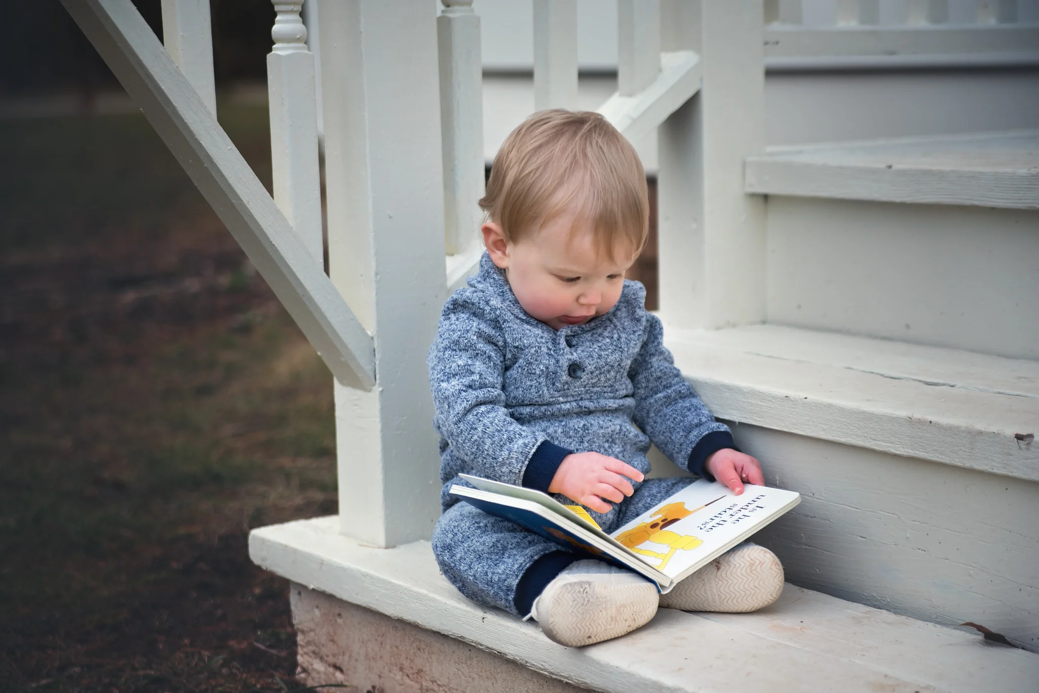 Toddler reading book by Fotoplicity.jpg