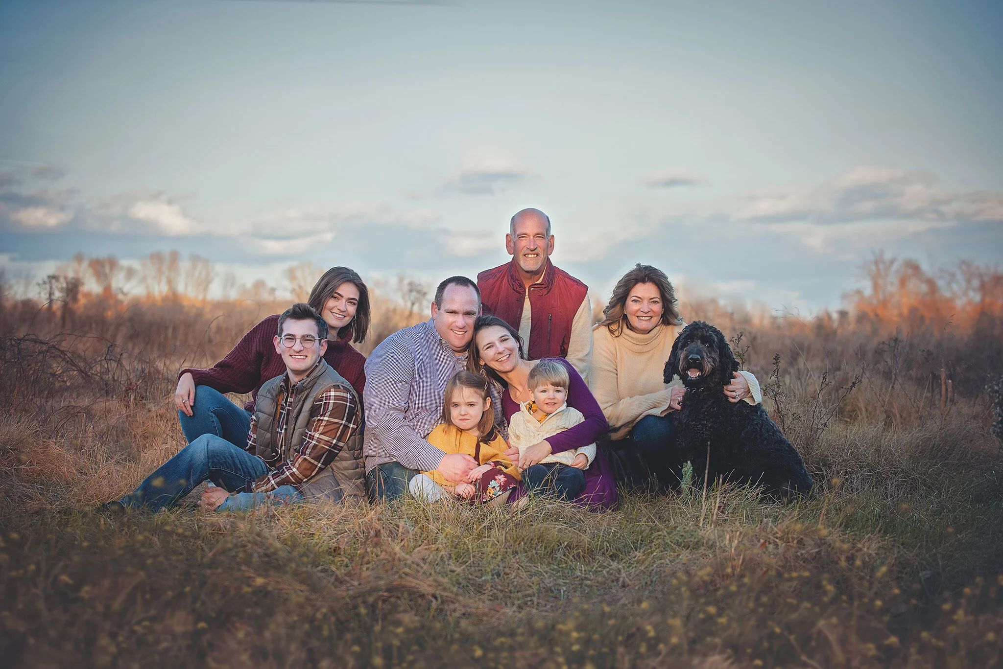 Extended family portrait session at golden hour in a field in Central New Jersey, photographed by Fotoplicity in East Brunswick NJ