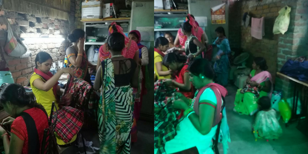 Women at SCIP Sews, busy stitching the new uniforms!