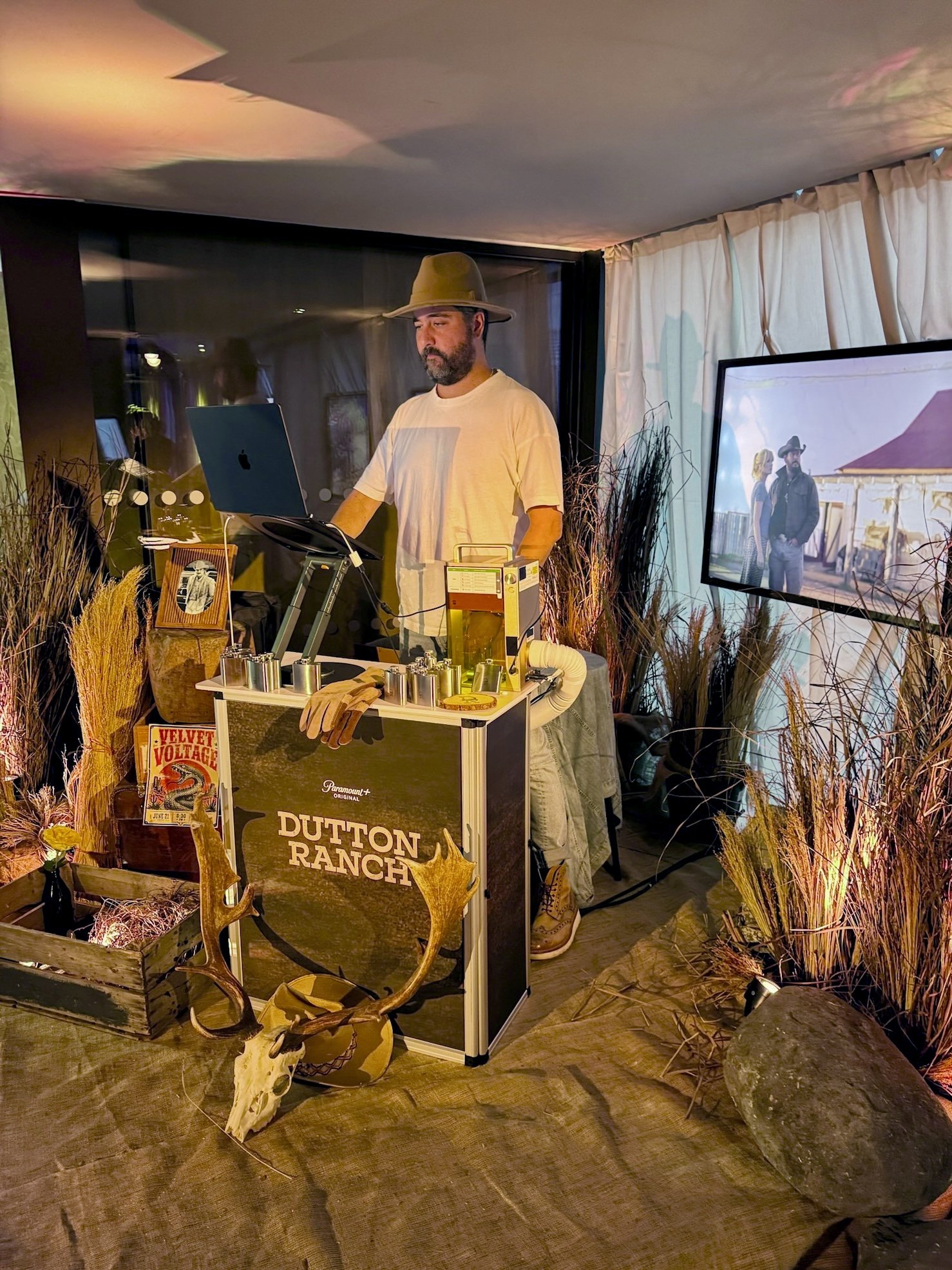 Live engraving station inside the Dutton Ranch themed venue