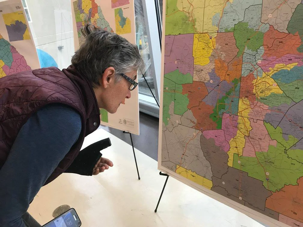 EmpowerMap Woman Looking at Map.jpg