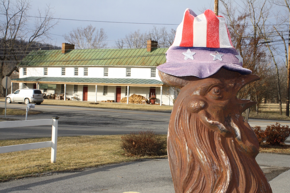 w Greg's Chicken mascot with Frye's Tavern behind .jpeg