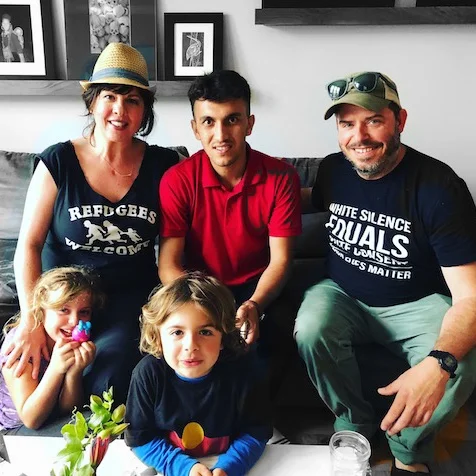 Juli, Bashir, her husband, and their family in their San Franciscan home