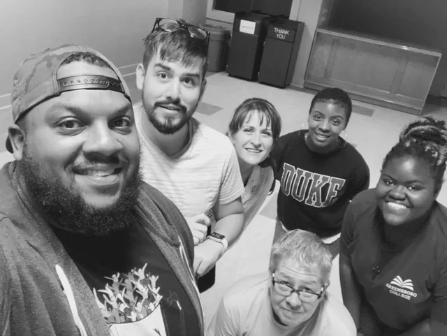 Joey and Patricia offering encouragement and answering questions at a training for the new downtown city village facilitators. Pictured from left to right: Brandon, Aiden, Vheenah (in front), Joey, Patricia, and Sydney (in back). 