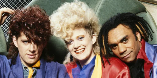 Note: This isn’t us either. This is the Thompson Twins, the wonderful New Wave act in the 80’s. More on them in a minute…
