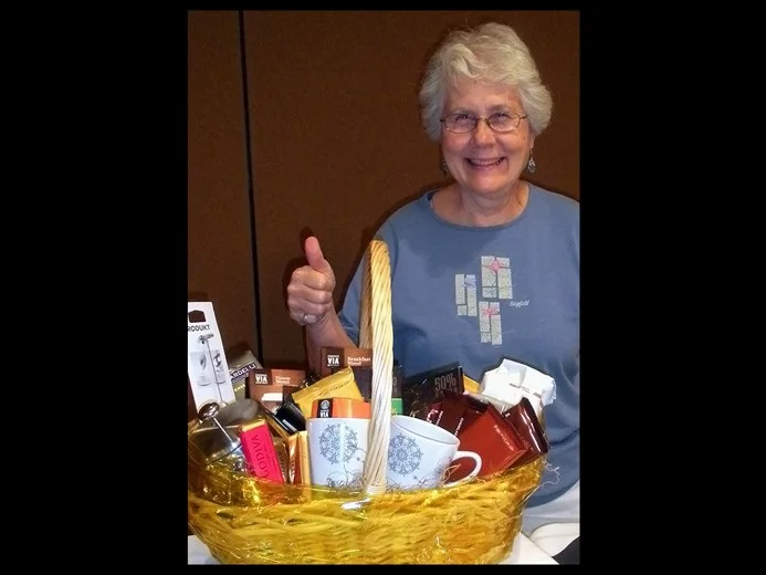 We raffle goody-filled gift baskets.