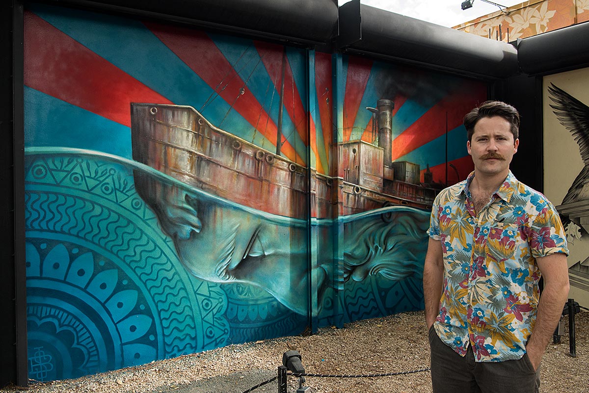 BEAU STANTON IN FRONT OF HIS WYNWOOD MURAL