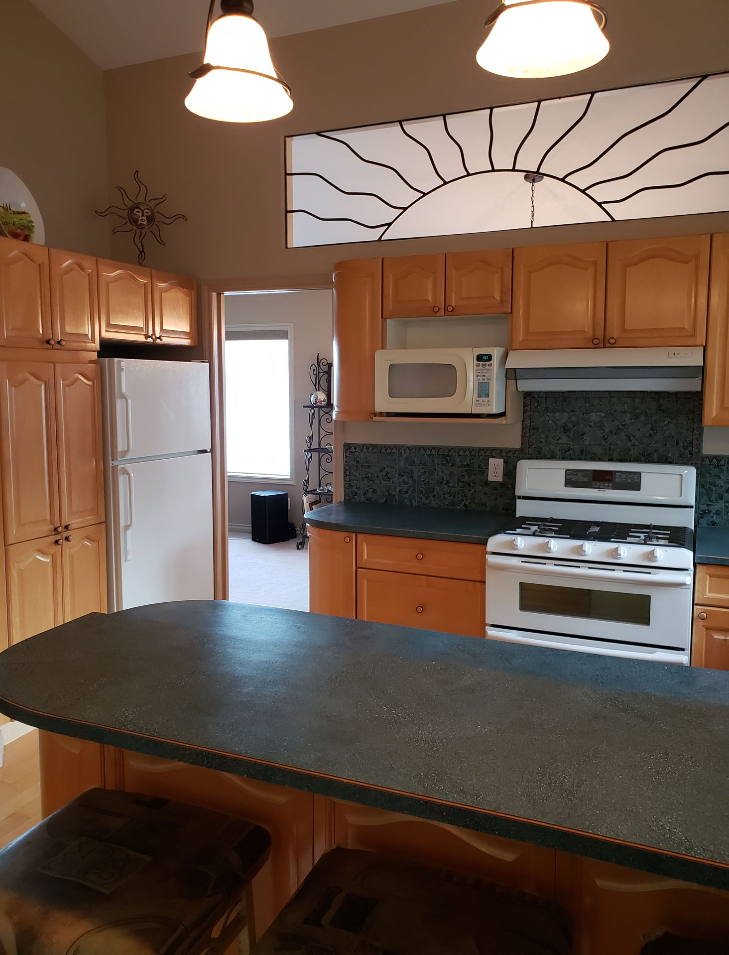 from kitchen into living & hall & stairwell