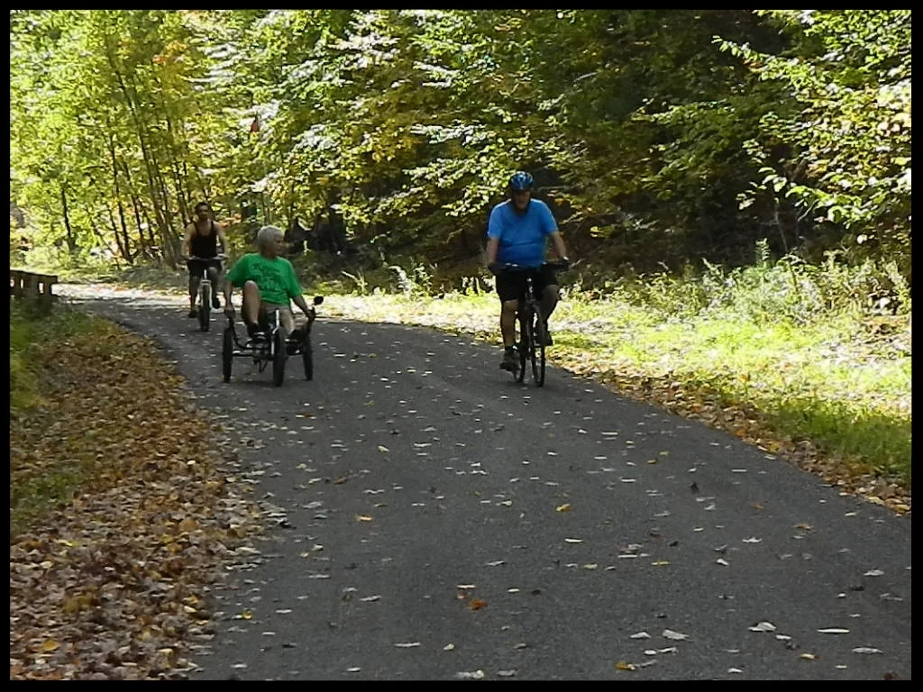 3 cyclist on trail.JPG