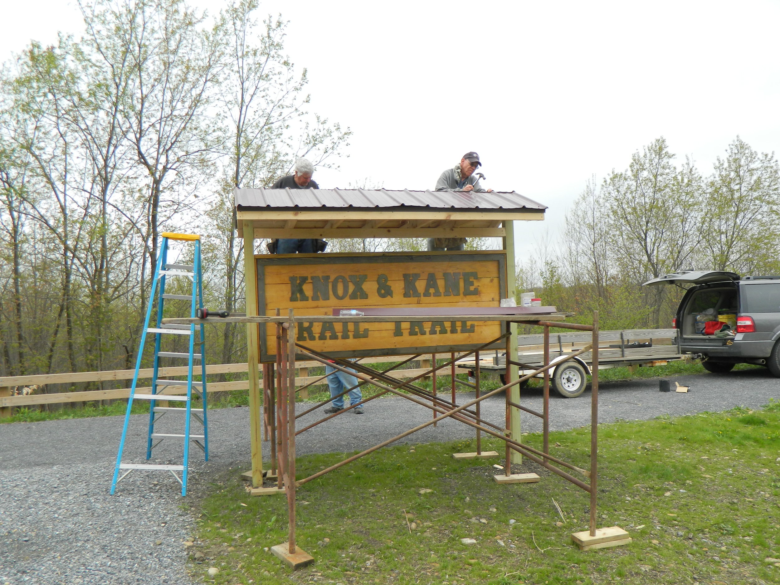 roofing the kiosk.JPG