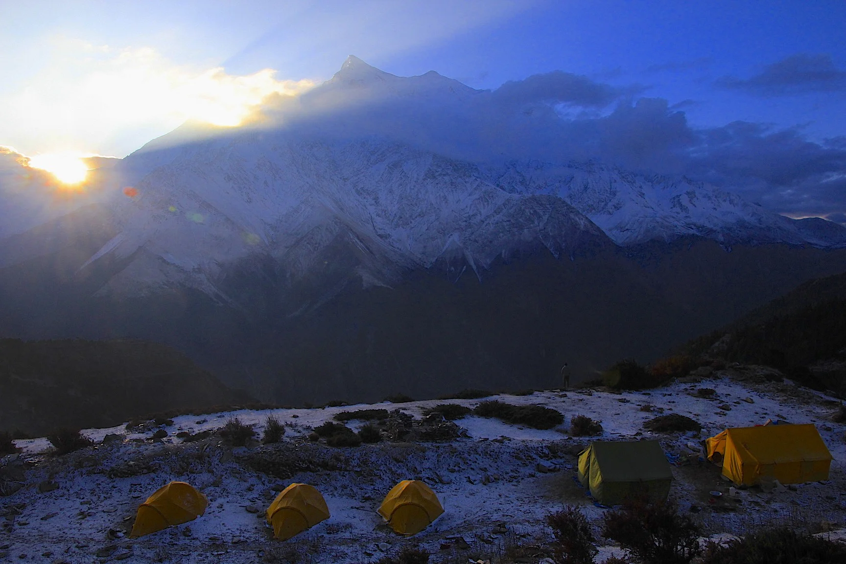 Annapurna 1 massif and the Kali Gandaki valley (the deepest valley in the world). Annapurna I is on the right side obscured by clouds.