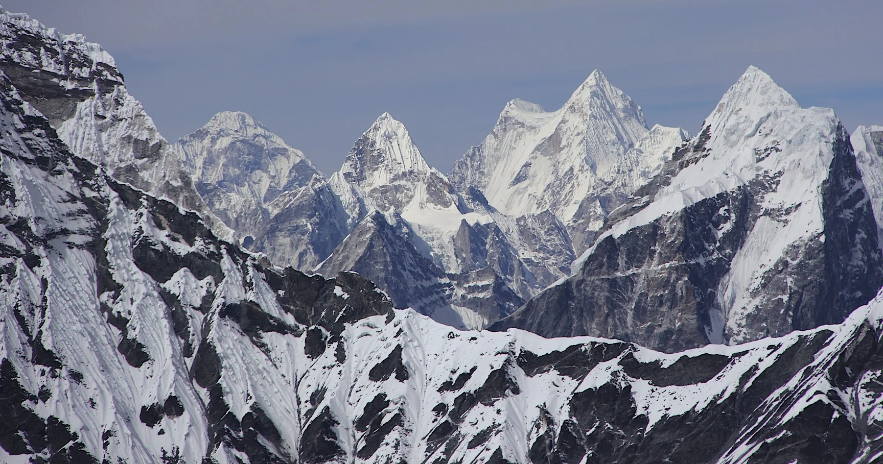 Mt. Menlungtse (looks like a saddle) in Tibet from the West Col.