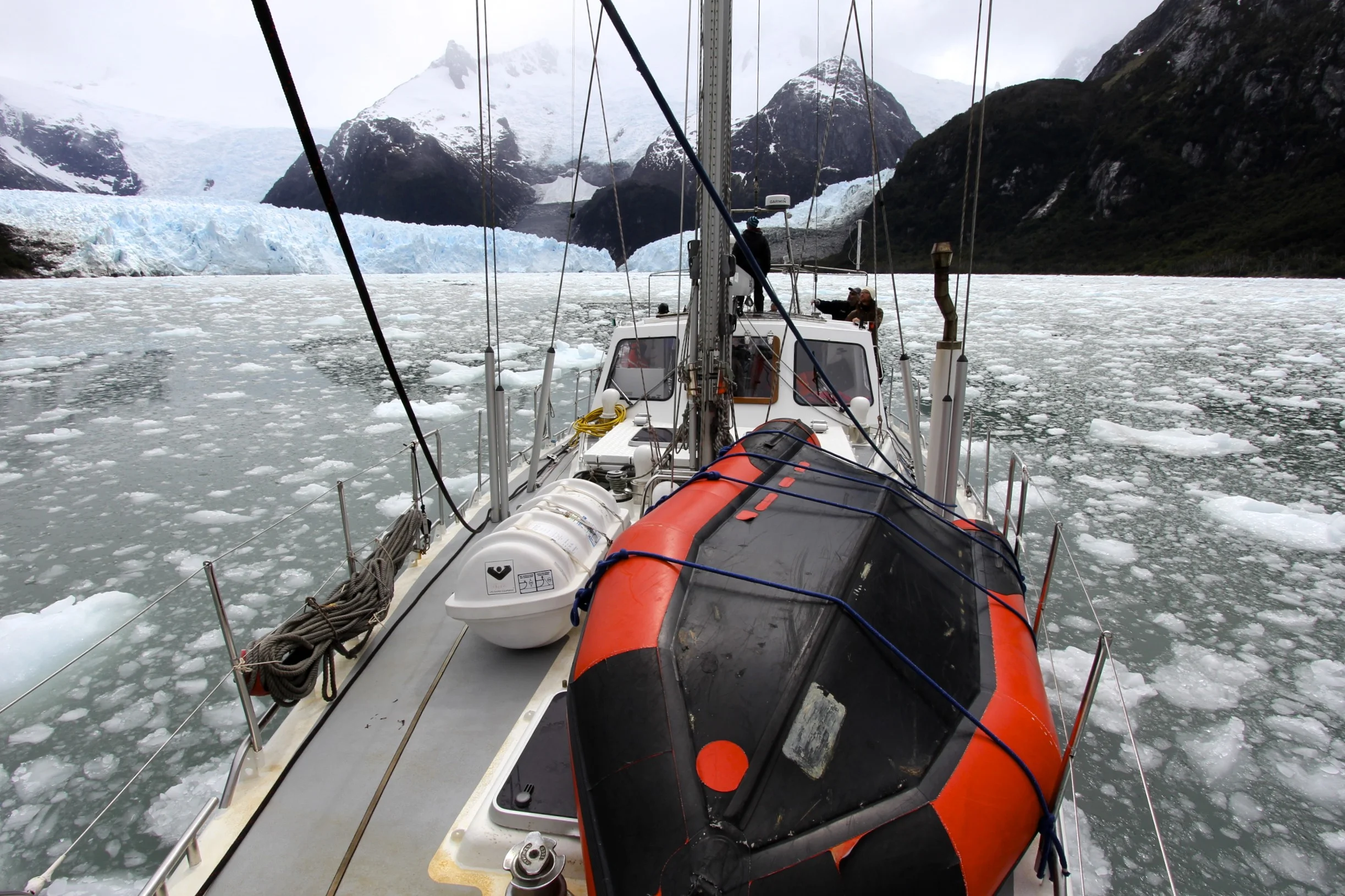 Watching the glacier action in the narrow fjord in the Tierra del Fuego