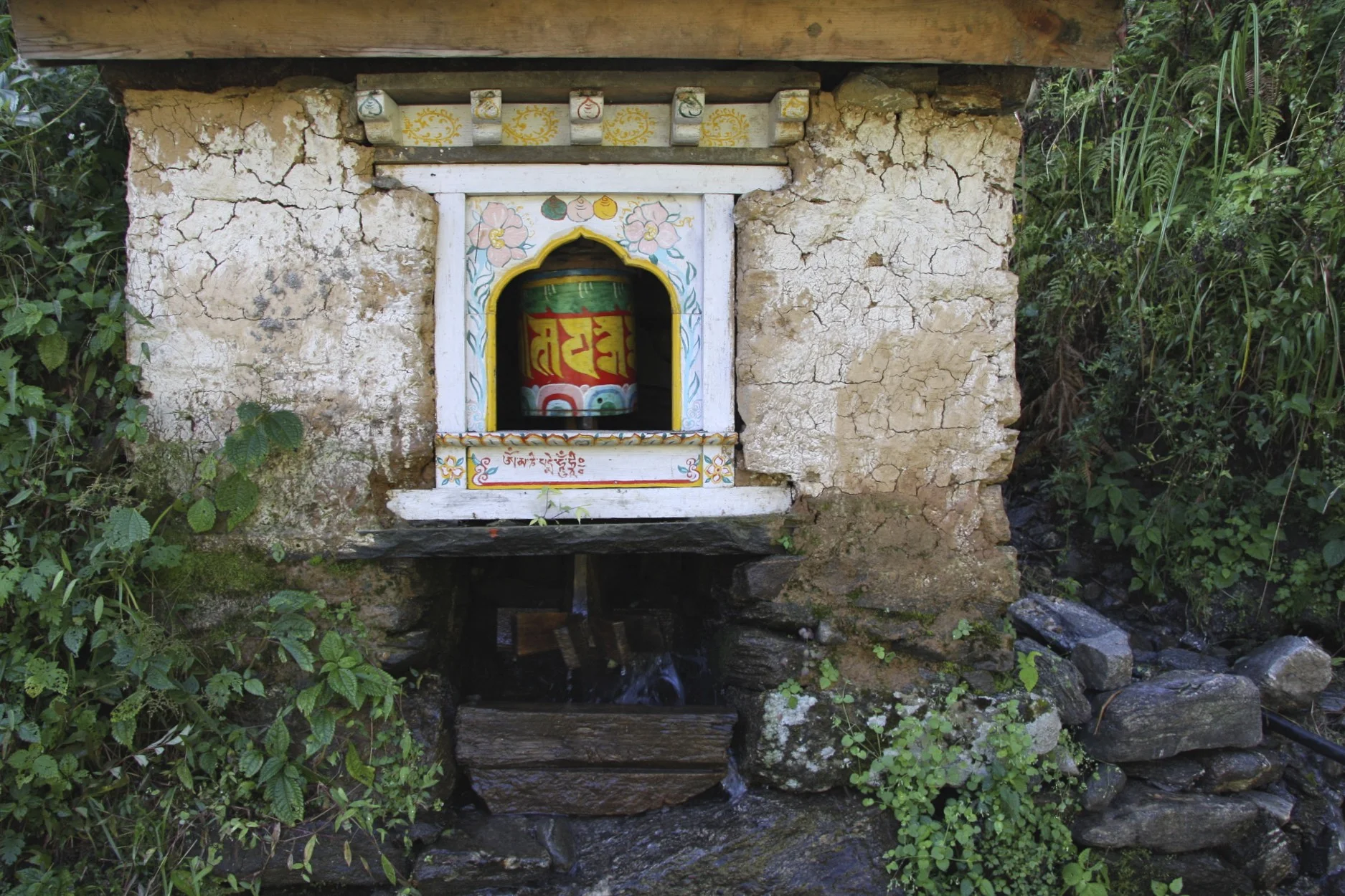 Water powered prayer wheel.