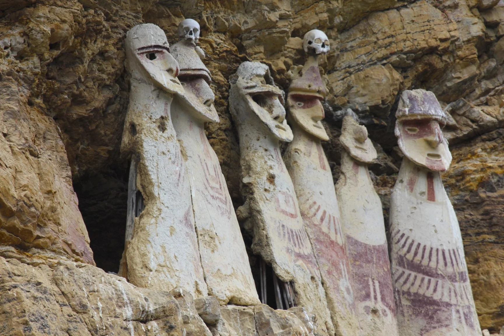 Sarcofagos de Karajia highlights the coffins of the Chachapoyas culture. Found in in a ravine, the sarcophagi sit in the Amazonian Luya district. Constructed of clay, sticks and grasses, with exaggerated jawlines. Their inaccessible location high above a river gorge has preserved them from destruction by looters.