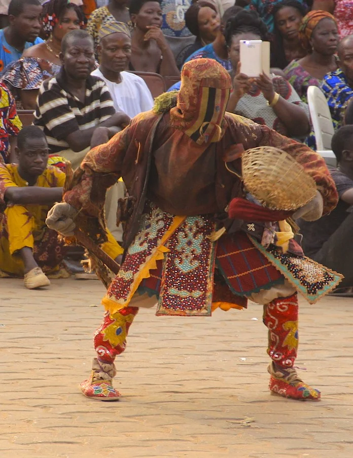 Egungun is a dance performance that opens a portal between the realm of the dead and the living. During the dance, the ancestors send blessings to the spectators and the entire community.