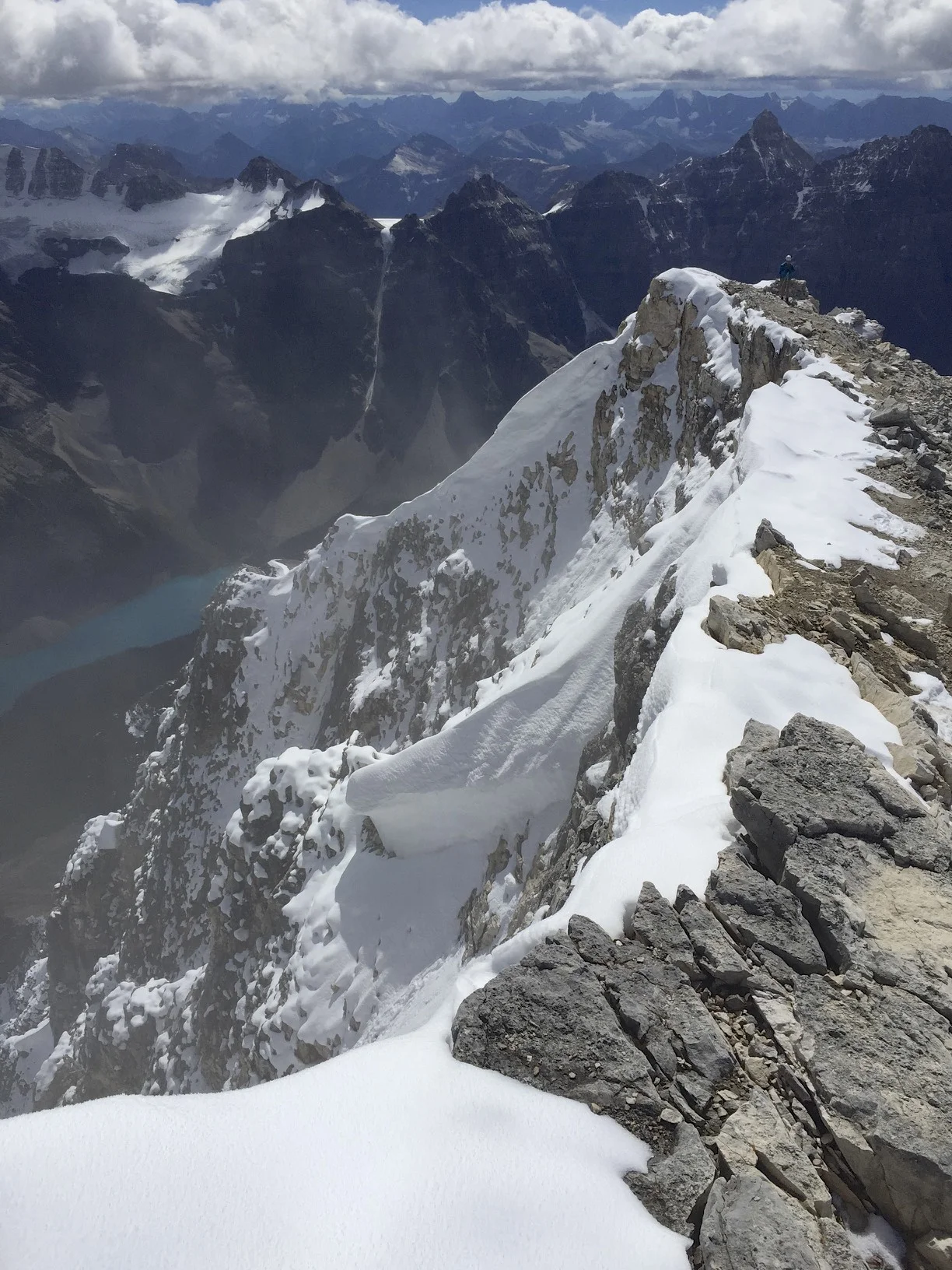 The summit ridge of Mt. Temple with Lake Moraine below