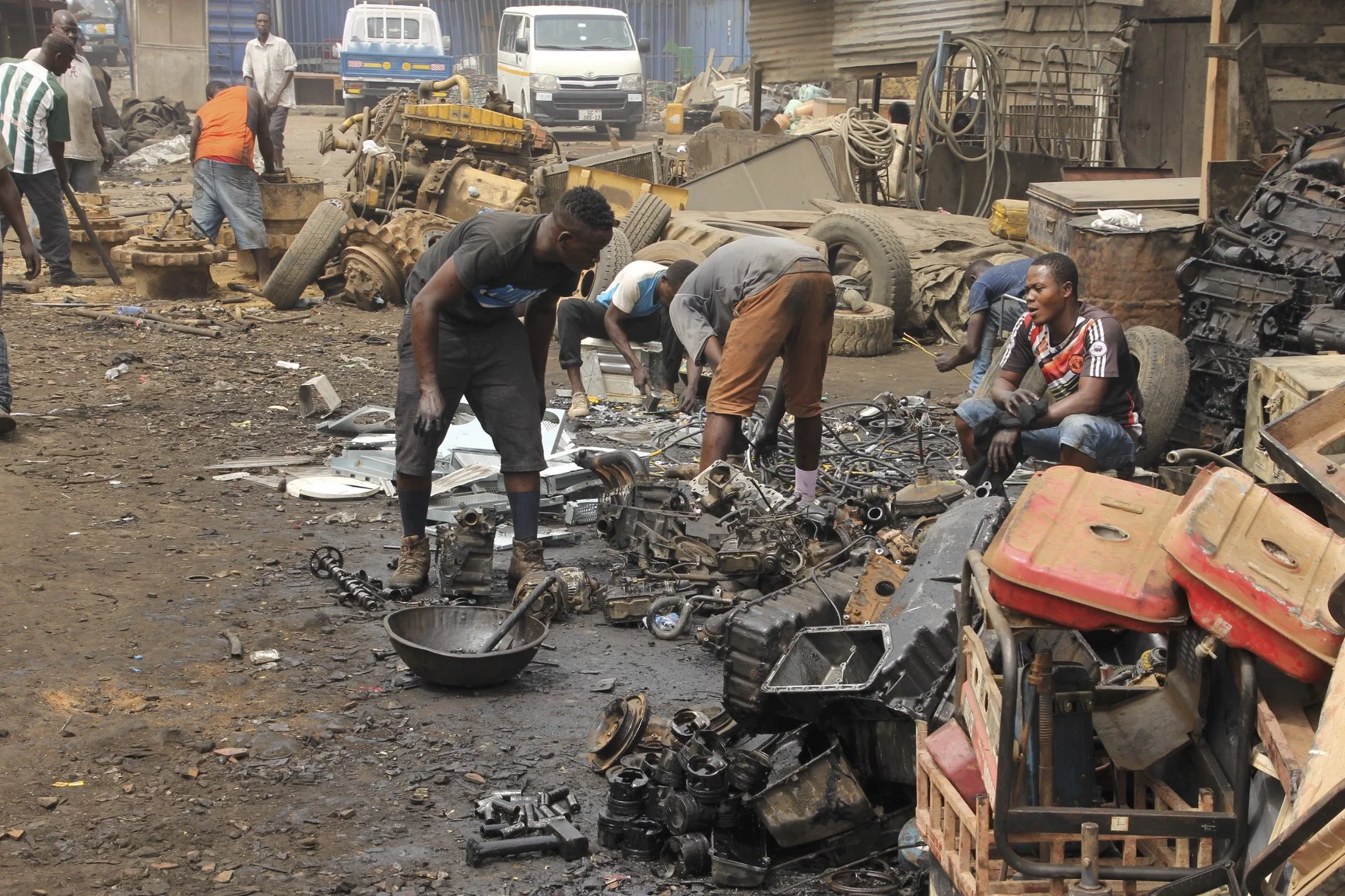 Largest recycling dump in the world. All sorts of appliances, computers, cars etc are taken apart and resold for scrap. It is a toxic and tedious job.