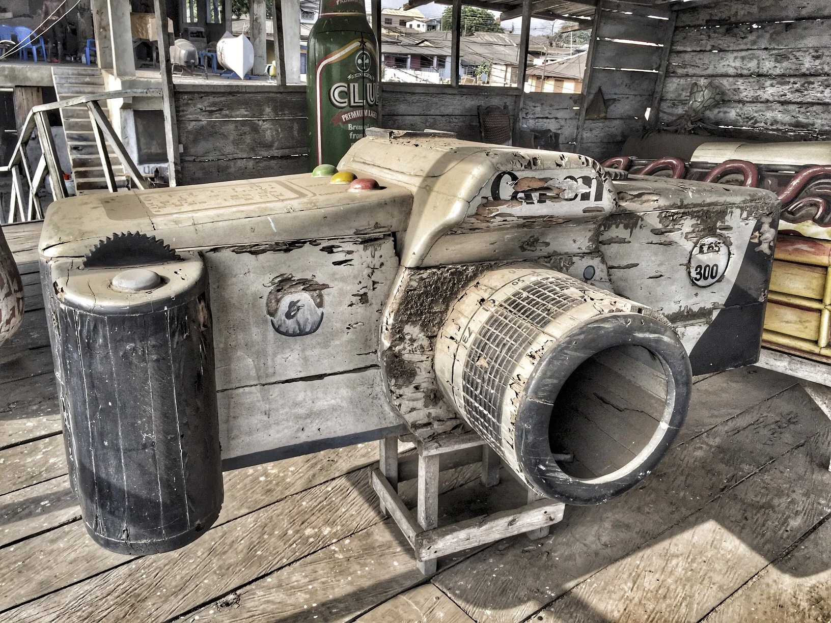 Fancy coffins made to order in Ghana - this one is for a photo enthusiast